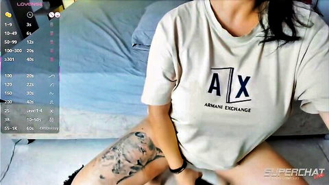 Juicy Asian MILF in white Armani t-shirt, tattooed thigh exposed