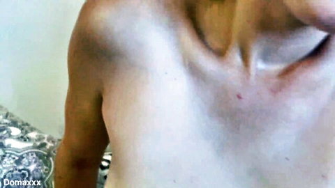Close-up of mature hairy MILF's bare neck and shoulders