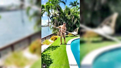 Zmeena Orr scene: nude muscular man by pool with net, sunny outdoor