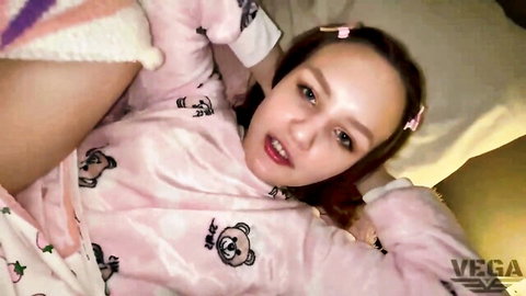 Cute dark-haired nubile in pink bear pajamas teasing for hard drill and cumshot