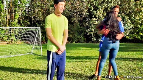 Diamond Jackson ebony MILF hugged by two men on soccer field