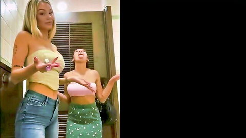 Heidi Grey and friend butt plug tease in public bathroom before walking plugged