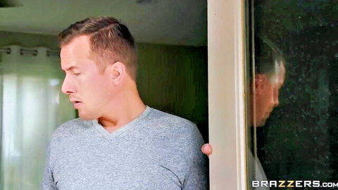 Surprised man peeking into steamy shower through bathroom door in Brazzers scene