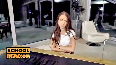 Nata Ocean in schoolgirl outfit, arms crossed at table POV