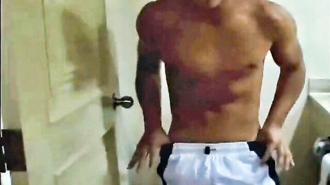 Muscular college straight guy showing off toned body and legs in shorts