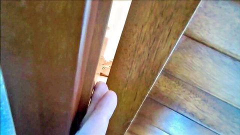 Ally Cooper peeking hand through door in stepmom-son vacation affair