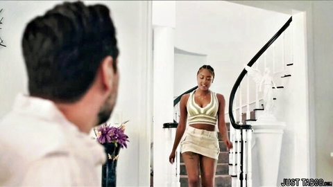 Stepdad watches sexy black teen stepdaughter in skimpy green top and tiny white skirt descend stairs