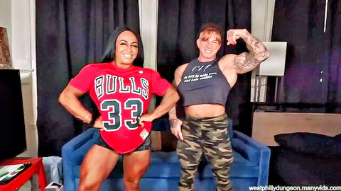 Brooke and Ruby muscular bodybuilders flexing in Bulls shirt and tank top