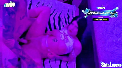 SkinLovers tattooed Asian in neon-lit vaginal penetration