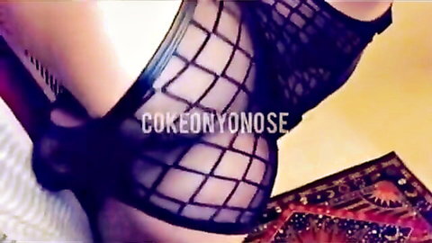 Cute lightskin woman in sheer black mesh lingerie bending over