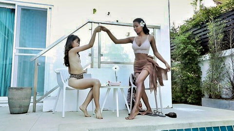 Sowan and Chloe in sensual topless lesbian tease by pool