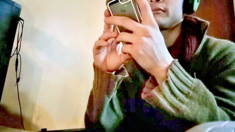Cute Latino man in sweater taking selfie, fondling in solo amateur video