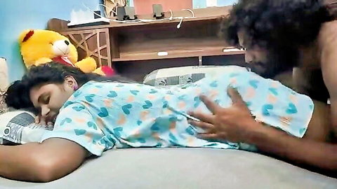 Desi Malayali wife in romantic spooning pose with husband, hand on bum