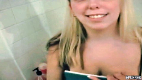 Christal Rose blonde amateur smiling topless in bathroom