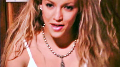 Blonde Kristina in white tank top and pearl necklace, seductive close-up tease