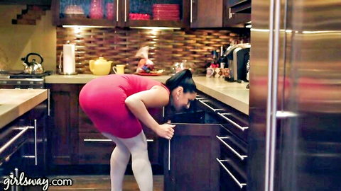Sheena Ryder bending over in tight red dress and stockings