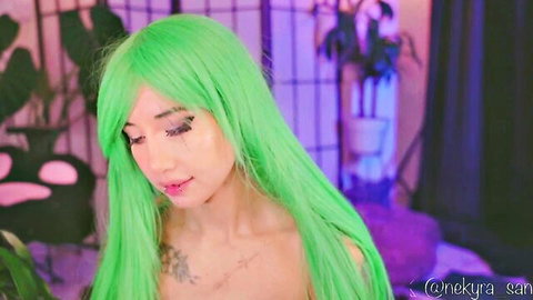 Nekyra San topless in green wig, teasing in amateur camshow