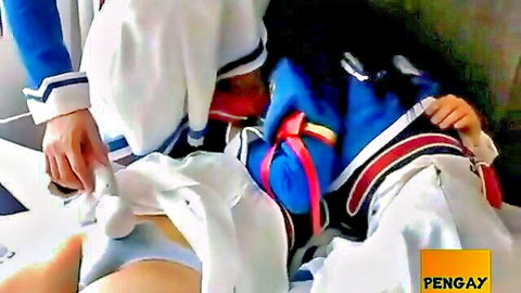 Three Japanese crossdressers in sailor uniforms handjob scene