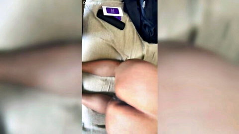 Blurry close-up of woman's bare curvy buttocks and thighs, amateur style