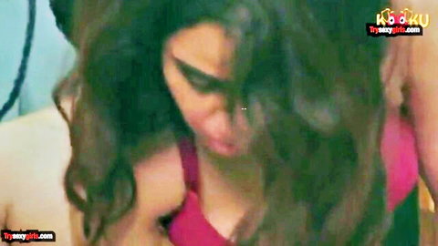 Curvy Indian woman in pink tank top showing cleavage in intimate embrace