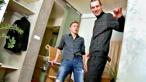 Two athletic Caucasian men standing casually in casual clothes, amateur gay friends scene