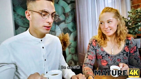 Mature auntie and step-mom tease young dude in cozy chat, 4K