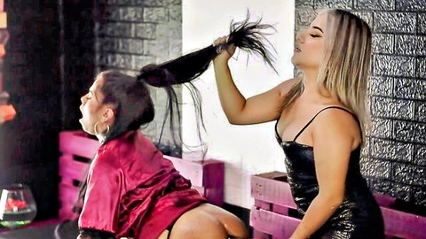 Blonde dominatrix yanks brunette's ponytail hard as she bends over exposing big juicy ass cheeks in rough play