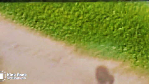 Woman squatting to shit in lush green outdoor field, scat nature fetish