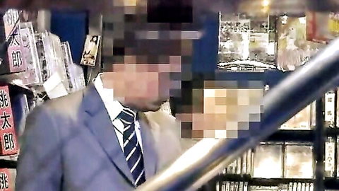 Blurry suited Japanese man in bookstore, suit fantasy JAV thumbnail