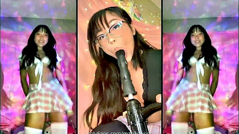 Asian schoolgirl with glasses deepthroating dildo in sexy uniform