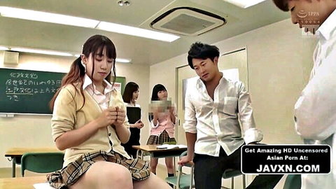 Japanese schoolgirls in uniforms in classroom, frozen time JAV scene