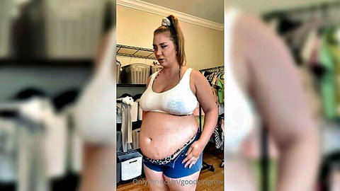 Pregnant BBW with huge tits and belly posing in tight white bra and blue panties