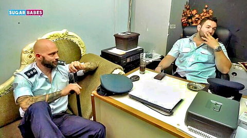 Two muscular Greek cops in uniforms for sexy police parody mission