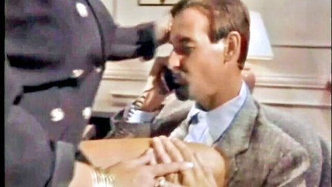 Keisha in sexy police uniform seduces suited man on phone, 1995