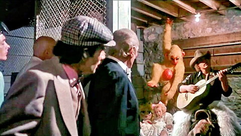 Annette Haven in 1979 Dracula Sucks vintage porn scene with costumed group