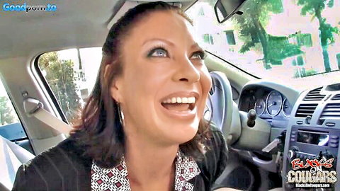 Smiling hot mature brunette in car, teasing before BBC action