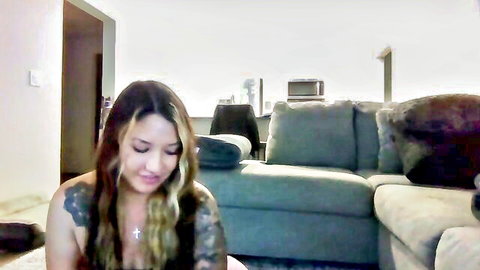 Dreamofjasmine tattooed blonde camgirl looking down intimately