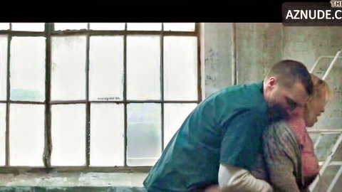 Patricia Arquette in intimate embrace with younger man in steamy scene