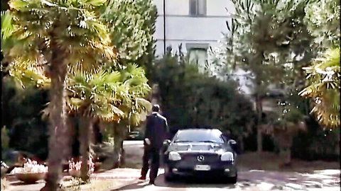 Man in suit approaches luxury Mercedes car outdoors in career woman XXX