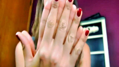 Ceara Lynch dominant hands with red nails in pay pig training