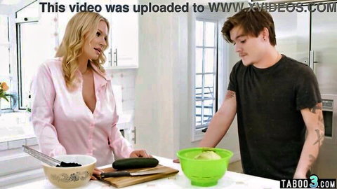 Rachael Cavalli as busty blonde stepmom teasing stepson in kitchen