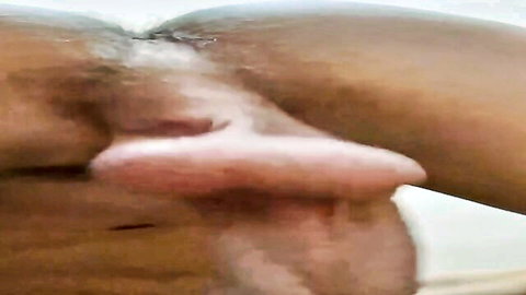 Close-up of black twink's glossy ear and neck in Hungtwinks 064