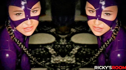 Seductive babe in shiny purple latex catsuit and cat mask teases in mirror reflection