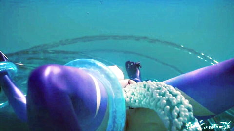 Purple skinned anime girl floats underwater on inner tube with thick cum dripping from shaved pussy