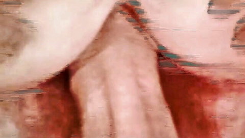 Closeup of woman's face covered in thick cum streaks from intense facial cumshot
