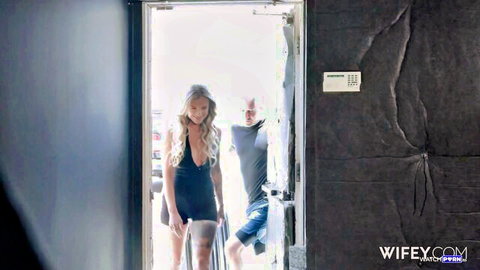 Blonde Anastasia in sexy black dress walking with man, MILFY preview