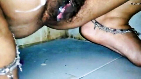 Close-up of Indian woman's hairy pussy with visible fluids and anklets