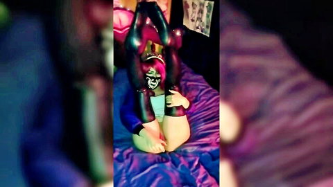 Black Kitsune cosplays KDA Akali in flexible pose with crystal dildo