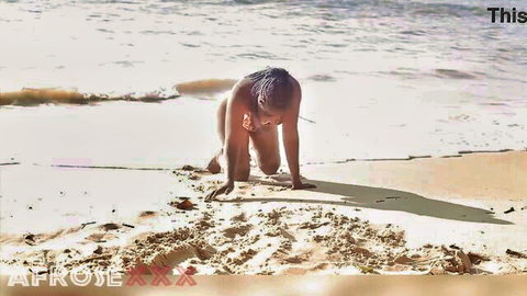 Naked black woman kneeling and flashing her pussy on public beach