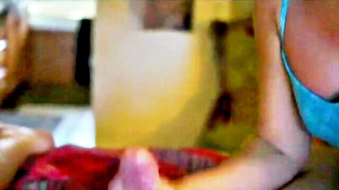 Sensual massage with Asian woman in blue bra, hands exploring her curves